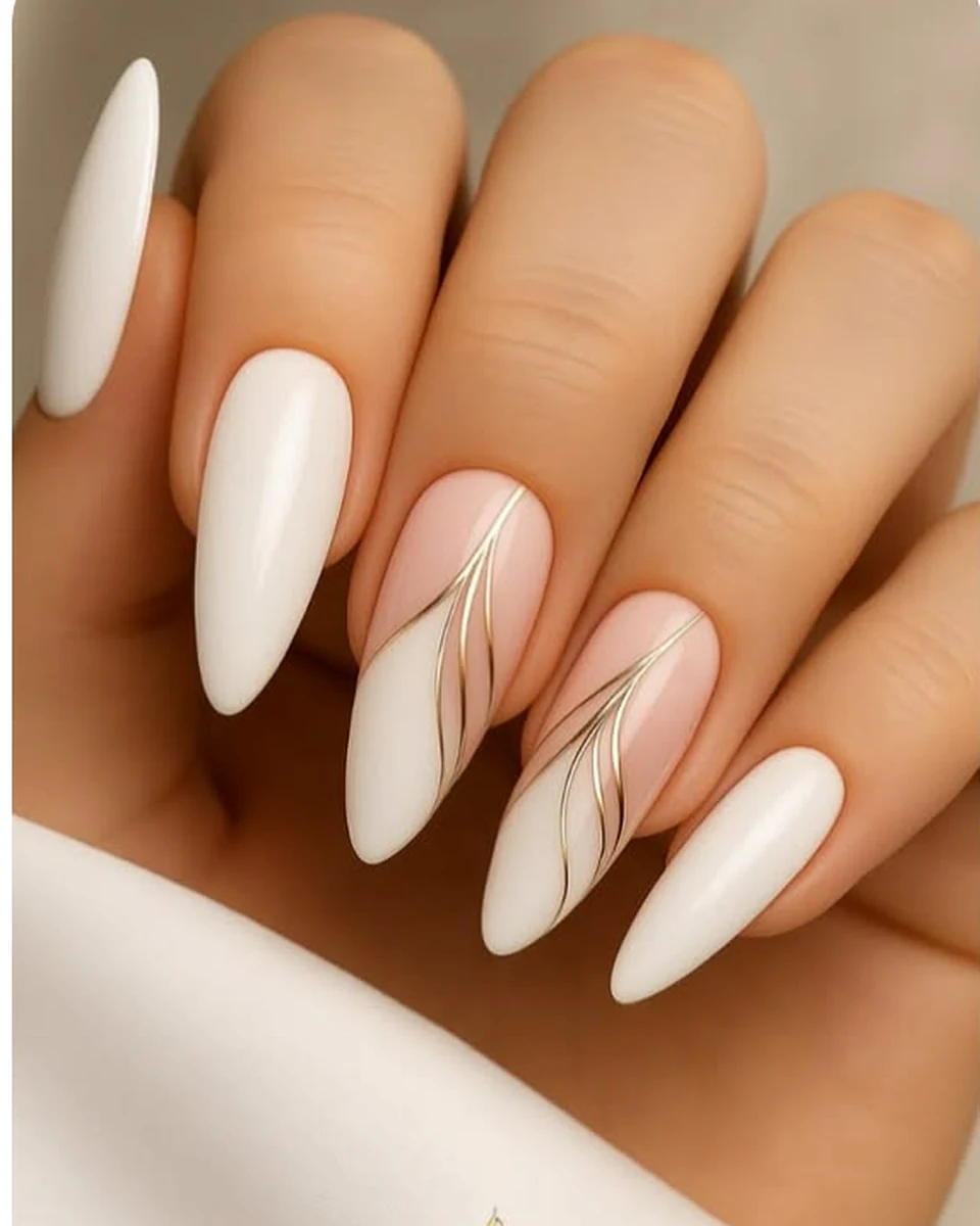 White nails with fine gold lines